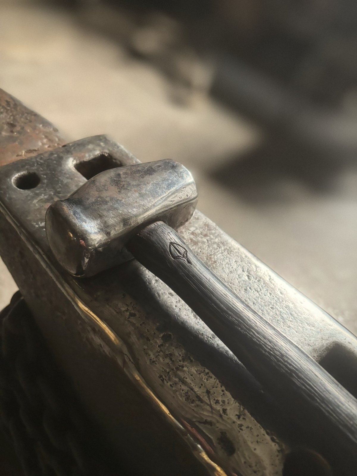A hammer resting on the anvil at The Forge, Queens Mill